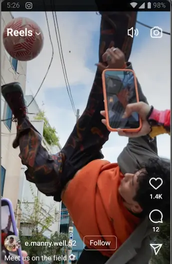 Instagram Elite Reels player showing a football freestyle video with like and comment counts