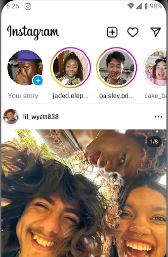 Instagram Elite home feed with story rings at the top and a photo post from a followed account